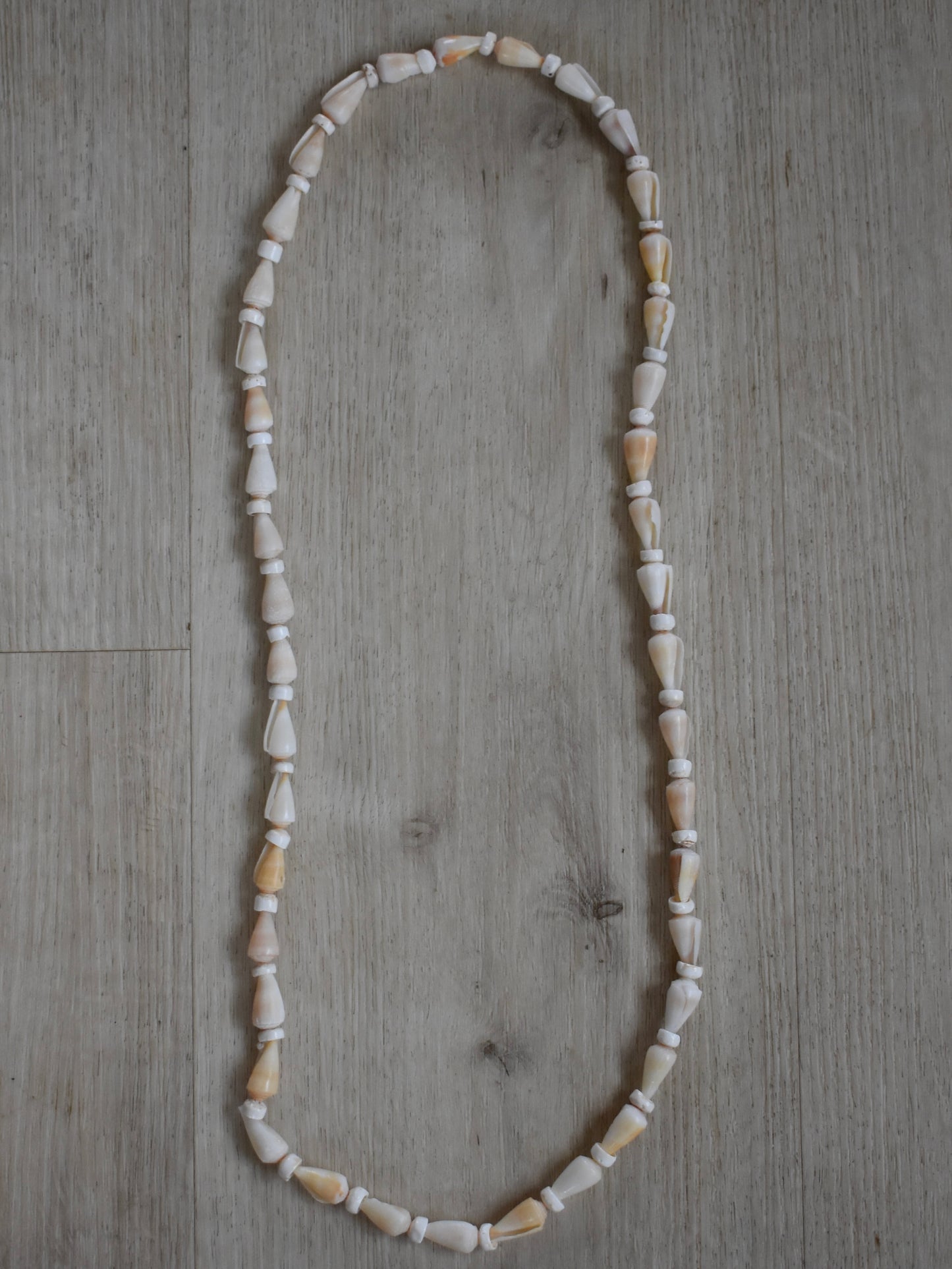 Cream Cone Shell + Puka Shell Lei